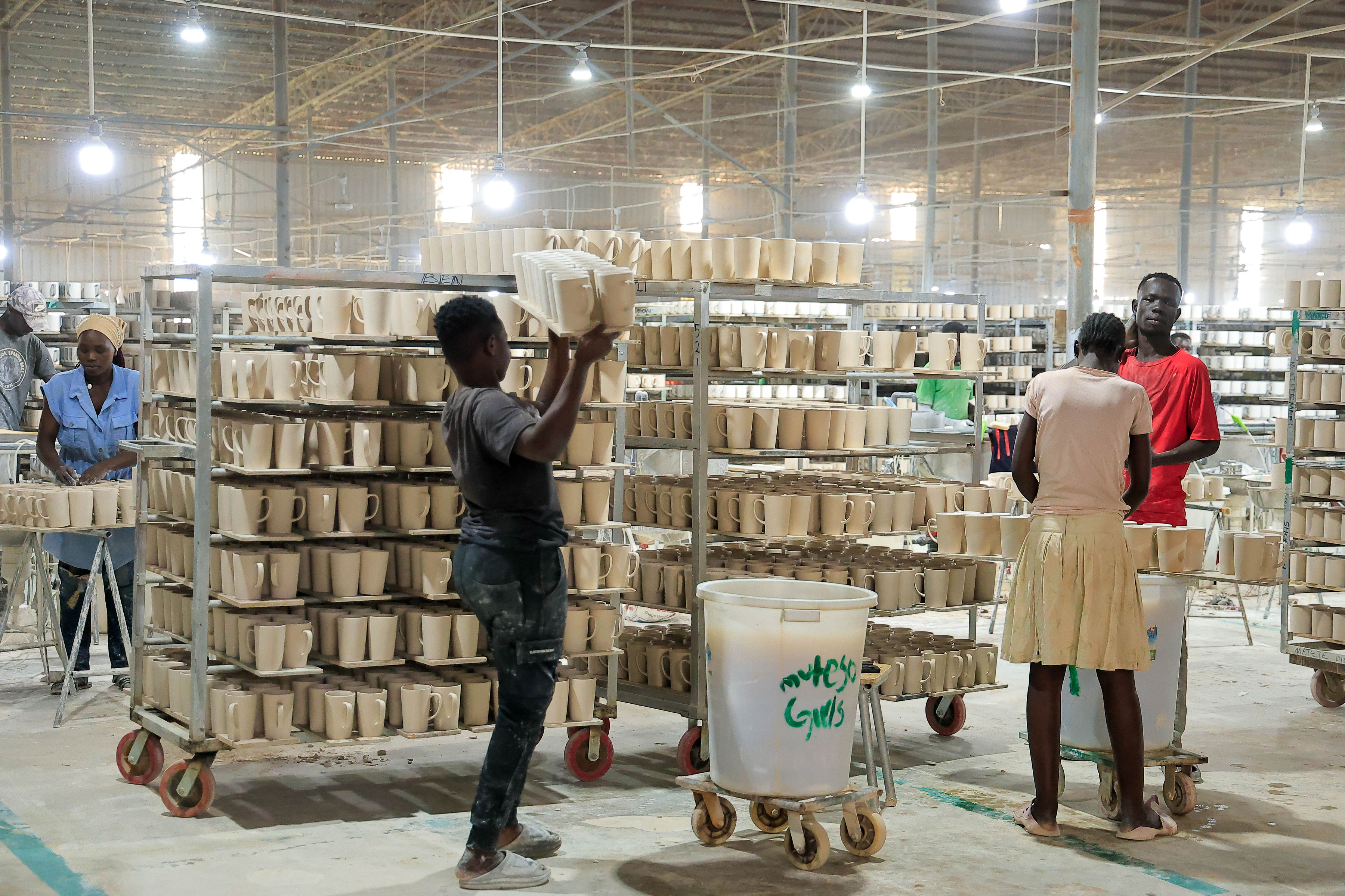 People at work in one of the factories at Kapeeka Industrial Park