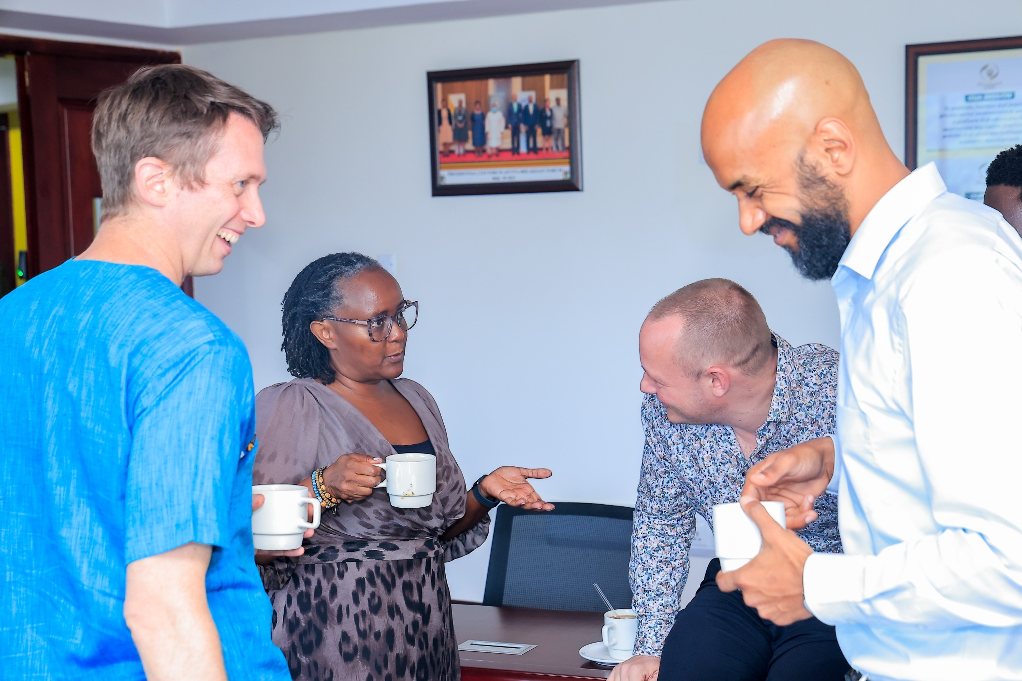 Stakeholders engage in informal discussions during a networking break at the E-Mobility Stakeholder Engagement Meeting hosted by the Presidential CEO Forum (PCF) in July 2026