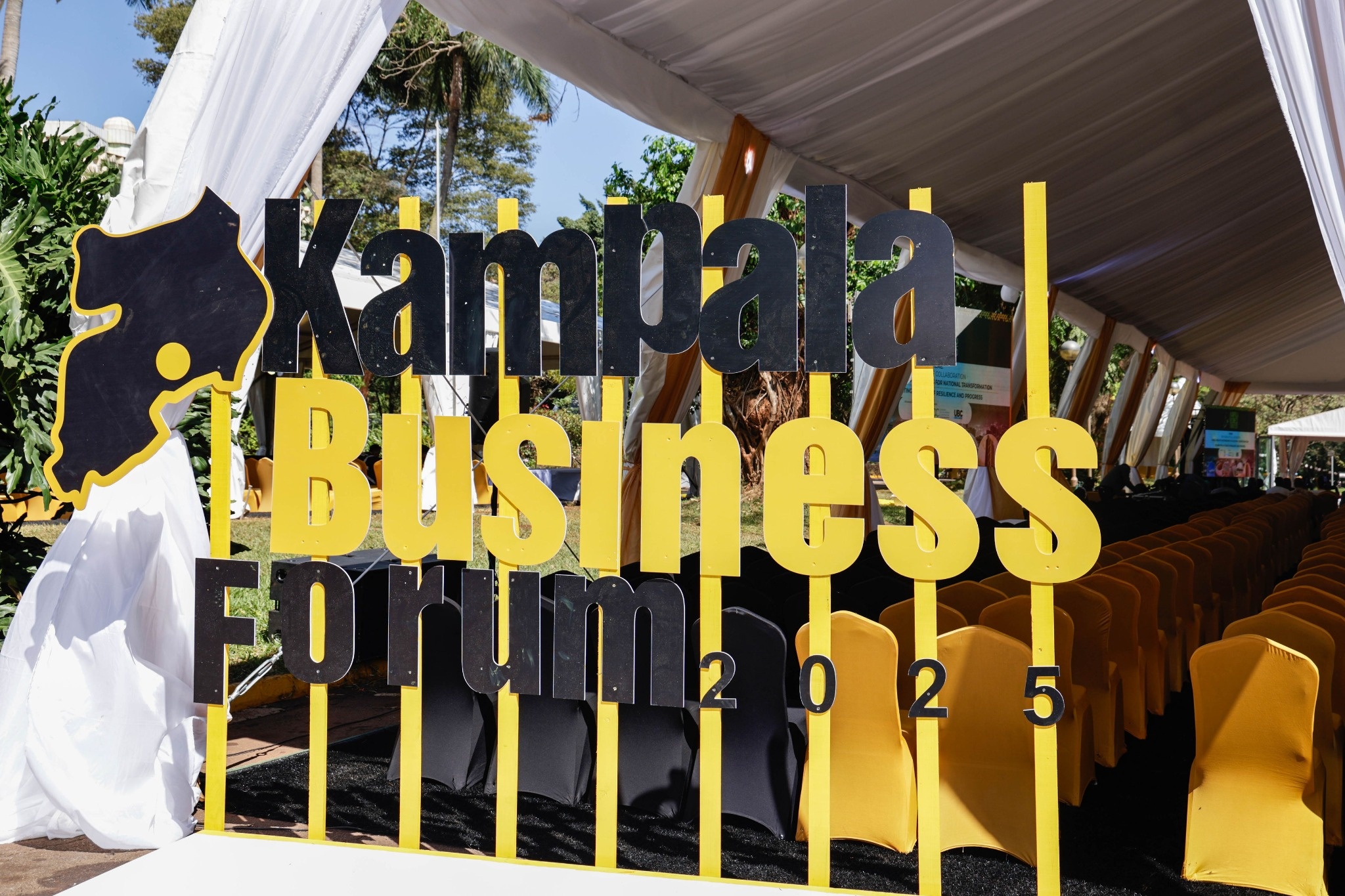 The Kampala Business Forum 2025 signage prominently displayed at the event venue, marking the gathering of over 1,000 CEOs, business executives, policymakers, and government officials. The Forum provided a platform for identifying reforms and strategic interventions necessary to drive industrialisation, investment, competitiveness, and inclusive economic growth.